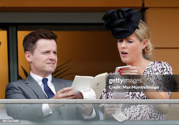 Declan Donnelly and Ali Astall watch the racing on day 2 of Royal Ascot at Ascot Racecourse on June 20, 2018 in Ascot, England.