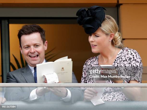 Declan Donnelly and Ali Astall watch the racing on day 2 of Royal Ascot at Ascot Racecourse on June 20, 2018 in Ascot, England.