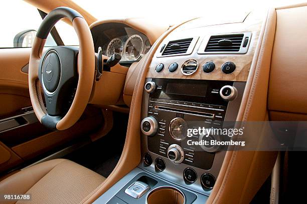 The center console and instrument cluster of the four door Aston Martin Rapide sedan is photographed in Bear Mountain State Park in Bear Mountain,...