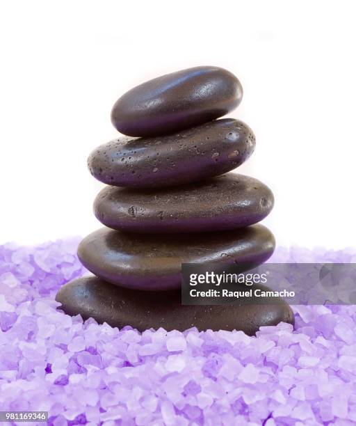 feng shui stones on bath salt - bath salt stock-fotos und bilder