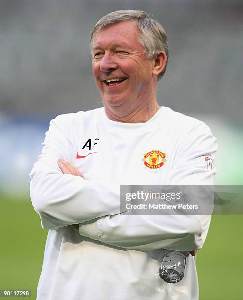 Manager Sir Alex Ferguson of Manchester United smiles during a First Team Training Session ahead of their UEFA Champions League Quarter-Final First...