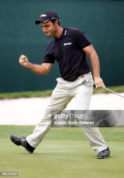 Edoardo Molinari of Italy celebrates a birdie putt on the 17th green during the completion of the final round of the Arnold Palmer Invitational...