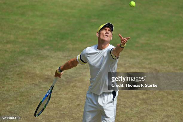 Matthew Ebden of Australia serves in his match against Roger Federer of Switzerland during day five of the Gerry Weber Open at Gerry Weber Stadium on...