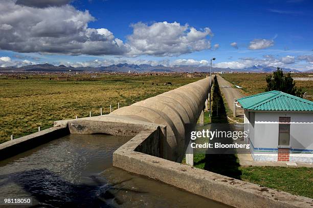 Pipes carry water treated at the state-owned Empresa Publica Social del Agua y Saneamiento SA Puchuckollo treatment facility in Viacha, Bolivia, on...