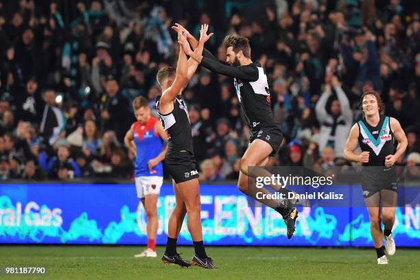 Justin Westhoff of the Power celebrates after kicking a goal during the round 14 AFL match between the Port Adelaide Power and the Melbourne Demons...