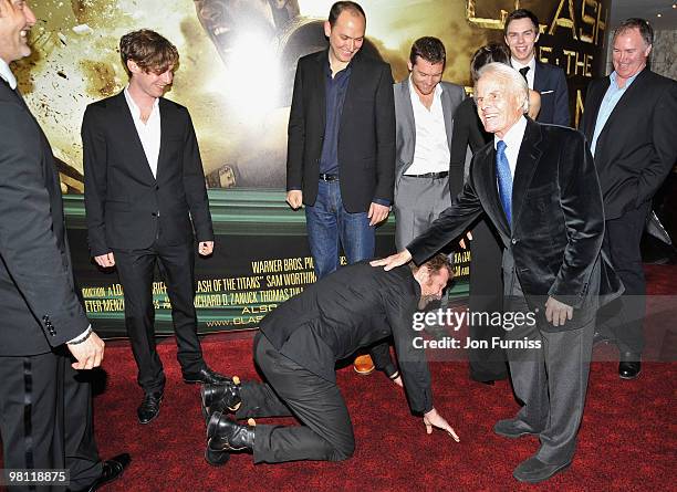 Actor Jason Flemyng and producer Richard D Zanuck share a joke as they attend the 'Clash Of The Titans' world premiere at the Empire, Leicester...