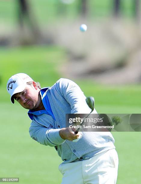 Graeme McDowell of Ireland plays a shot during the first round of the Honda Classic at PGA National Resort And Spa on March 4, 2010 in Palm Beach...