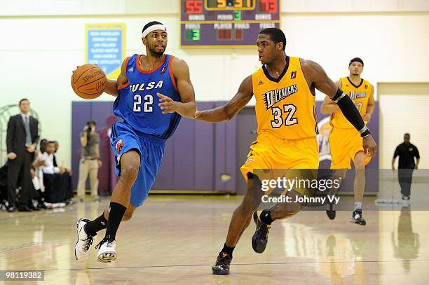 Mustafa Shakur of the Tulsa 66ers drives past Frank Robinson of the Los Angeles D-Fenders during the D-League game on February 10, 2010 at Toyota...