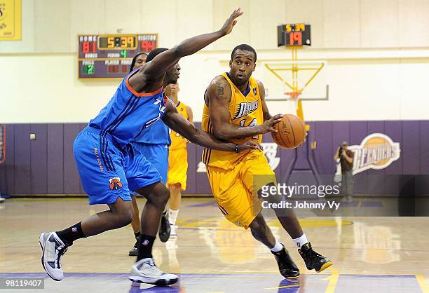 Joe Crawford of the Los Angeles D-Fenders drives past James Wright of the Tulsa 66ers during the D-League game on February 10, 2010 at Toyota Sports...