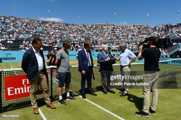 Lars Graff of Sweden ATP Supervisor, Lleyton Hewitt of Australia, Stephen Farrow of United Kindgom Tournament Director celebrating Jim Moore of...