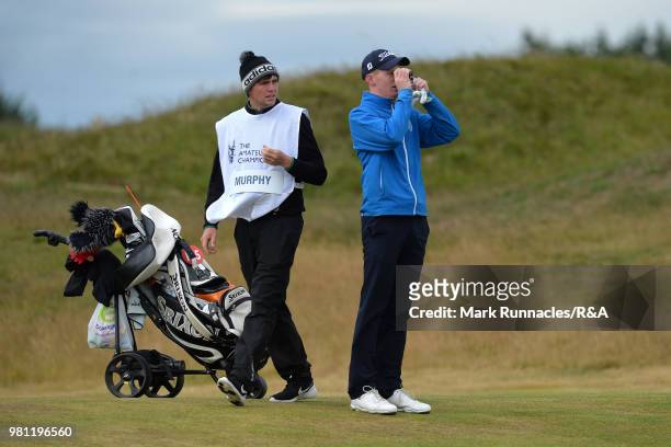 John Murphy of Kinsale , checks his yardage at the 4th hole during the quarter final of The Amateur Championship at Royal Aberdeen on June 22, 2018...