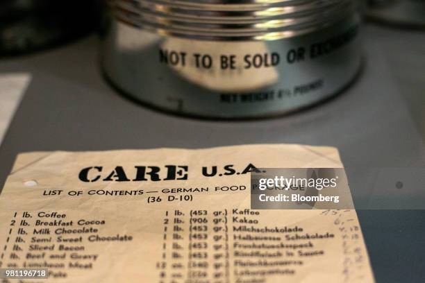 List of contents for a Cooperative for Assistance and Relief Everywhere package sits on display at the Allied Museum in Berlin, Germany, on Friday,...