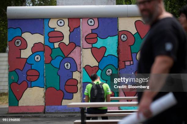 Graffiti adorns a section of the Berlin wall at the Allied Museum in Berlin, Germany, on Friday, June 15, 2018. Visitors to the museum on Clayallee...