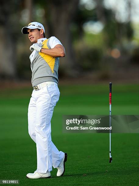 Camilo Villegas of Columbia loses his club on the 11th hole during the final round of the Honda Classic at PGA National Resort And Spa on March 7,...