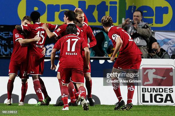 Erik Jendrisek of Kaiserslautern celebrates his team's second goal with team mates during the Second Bundesliga match between 1. FC Kaiserslautern...