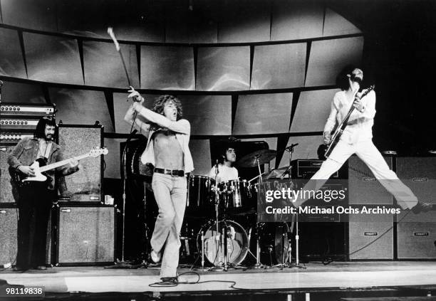 Bassist John Entwistle, singer Roger Daltrey, drummer Keith Moon and guitarist Pete Townshend of the rodk and roll band "The Who" perform onstage in...