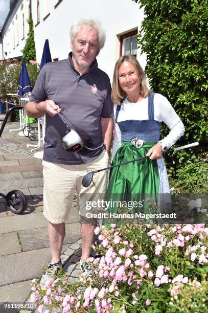 Actor Guenther Maria Halmer and Sybille Beckenbauer during the 7. M & M + EAGLES Charity - LEDERHOS'N Golf Cup 2018 at Golfclub Castle EGMATING on...