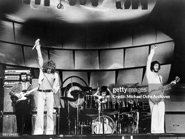 Bassist John Entwistle, singer Roger Daltrey, drummer Keith Moon and guitarist Pete Townshend of the rodk and roll band "The Who" perform onstage in...