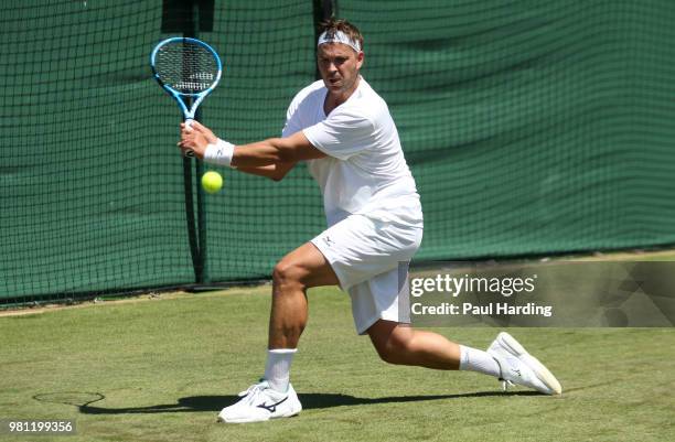 Marcus Willis of Great Britain in action during his qualifying match at Southlands College Tennis Courts on June 22, 2018 in London, England.