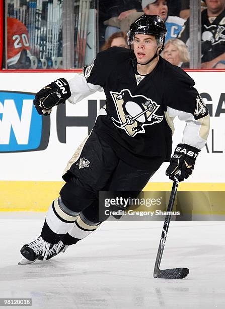 Tyler Kennedy of the Pittsburgh Penguins skates up ice against the Philadelphia Flyers on March 27, 2010 at Mellon Arena in Pittsburgh, Pennsylvania.