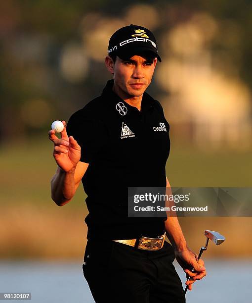 Camilo Villegas of Columbia reacts to a par putt on the 18th hole during the third round of the Honda Classic at PGA National Resort And Spa on March...