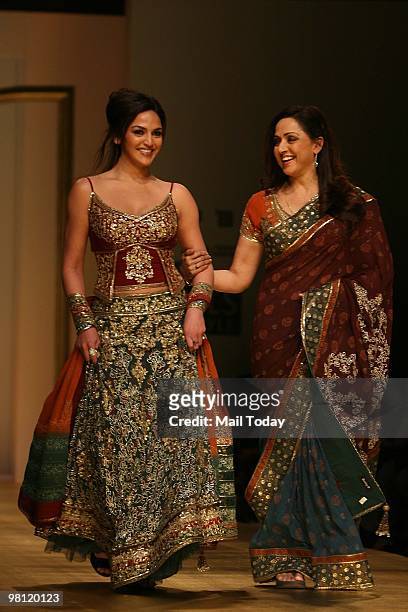Actress Hema Malini with daughter Esha Deol walk the ramp for designer Rocky S at day three of the Wills Lifestyle India Fashion Week Autumn Winter...