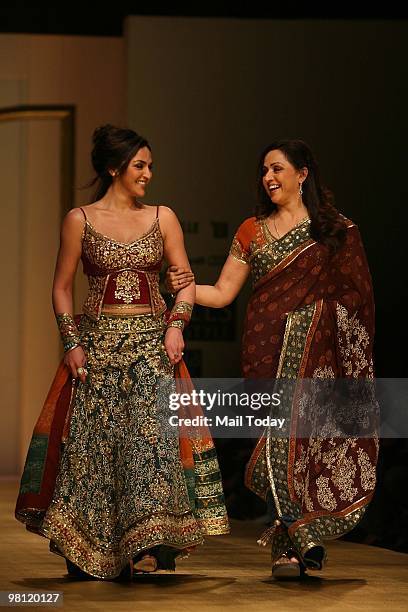 Actress Hema Malini with daughter Esha Deol walk the ramp for designer Rocky S at day three of the Wills Lifestyle India Fashion Week Autumn Winter...