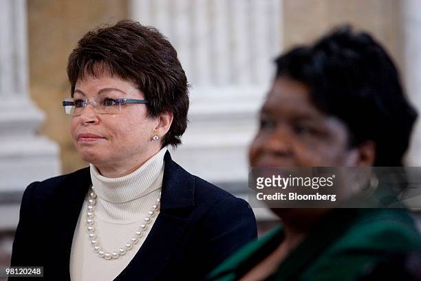 Valerie Jarrett, senior advisor to U.S. President Barack Obama, left, listens during the Women in Finance Symposium with Donna Gambrell, fund...