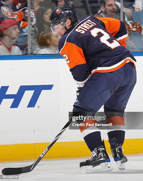 Defenseman Mark Streit of the New York Islanders skates during an NHL game against the Calgary Flames at the Nassau Coliseum on March 25, 2010 in...