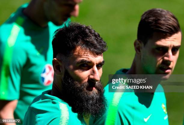 Australia's midfielder Mile Jedinak arrives for a training session in Kazan on June 22 during the Russia 2018 World Cup football tournament.