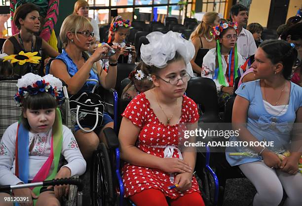 Group of children, descendants of people affected by the 1986 Chernobyl nuclear accident, participate in a celebration for the 20th anniversary of...