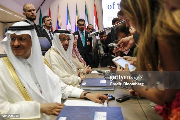 Khalid Al-Falih, Saudi Arabia's energy and industry minister, second left, speaks to reporters ahead of the 174th Organization Of Petroleum Exporting...