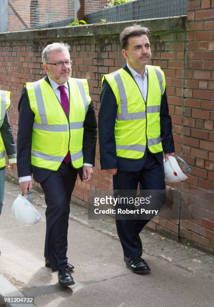 David Mundell , Secretary of State for Scotland and Professor Tom Inns , Director of The Glasgow School inspect the damage done to the Mackintosh...