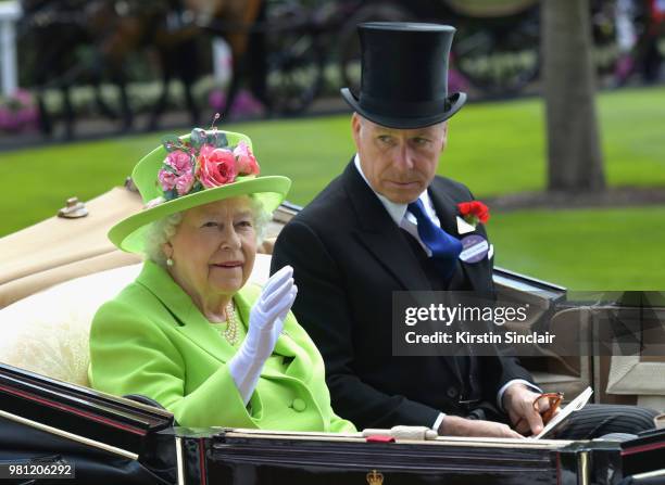 Queen Elizabeth II and David Armstrong-Jones, Earl of Snowdon arrive in the Royal procession on day 4 of Royal Ascot at Ascot Racecourse on June 22,...