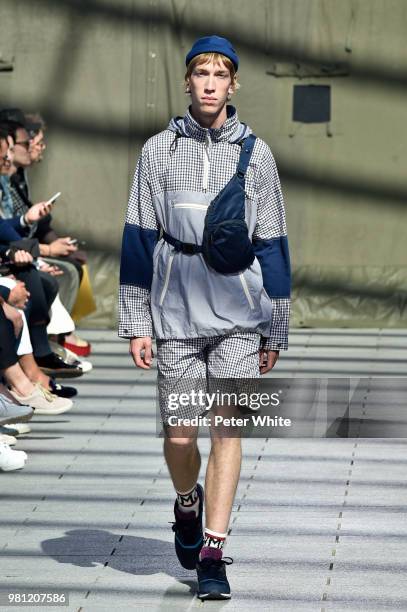 Model walks the runway during the Junya Watanabe Man Menswear Spring/Summer 2019 show as part of Paris Fashion Week on June 22, 2018 in Paris, France.