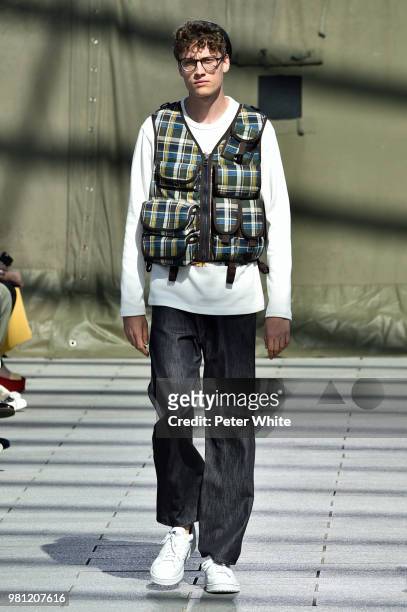 Model walks the runway during the Junya Watanabe Man Menswear Spring/Summer 2019 show as part of Paris Fashion Week on June 22, 2018 in Paris, France.