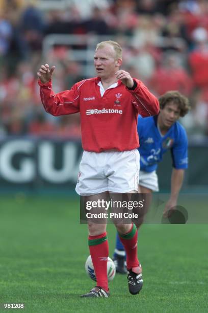 Neil Jenkins of Wales celabrates their win over Italy at the enf of the LLoyds TSB six Nations Championship between Italy and Wales at the Stadia...