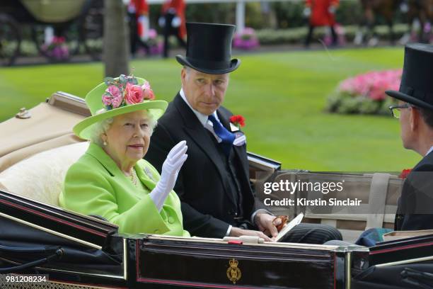 Queen Elizabeth II and David Armstrong-Jones, Earl of Snowdon arrive in the Royal procession on day 4 of Royal Ascot at Ascot Racecourse on June 22,...