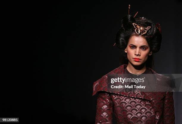 Neha Kapur walks the ramp for designer Nandita Basu at day Four of the Wills Lifestyle India Fashion Week Autumn Winter 2010 in New Delhi on March...