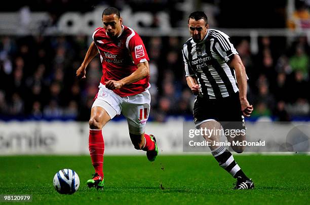 Nathan Tyson of Nottingham Forest outpaces Jose Enrique of Newcastle United during the Coca-Cola Championship match between Newcastle United and...