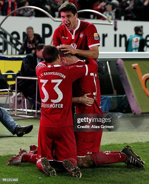 Erik Jendrisek of Kaiserslautern celebrates his team's third goal with team mates Markus Steinhoefer , Adam Nemec and Florian Dick during the Second...