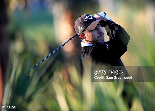 Jeev Milkha Singh of India hits a shot during the second round of the Honda Classic at PGA National Resort And Spa on March 5, 2010 in Palm Beach...