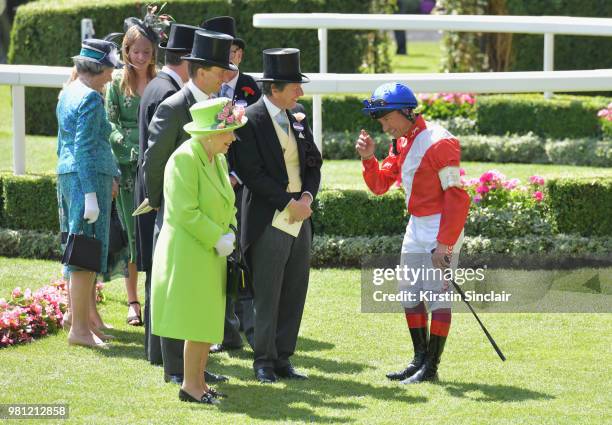 Queen Elizabeth II and John Warren speak with jockey Frankie Dettori on day 4 of Royal Ascot at Ascot Racecourse on June 22, 2018 in Ascot, England.