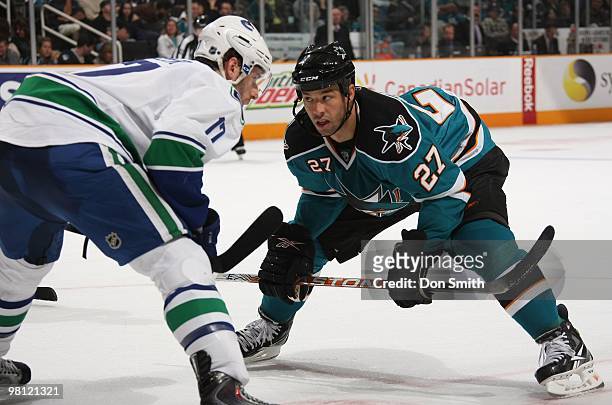 Ryan Kesler of the Vancouver Canucks waits for the faceoff against Manny Malhotra of the San Jose Sharks during an NHL game on March 27, 2010 at HP...