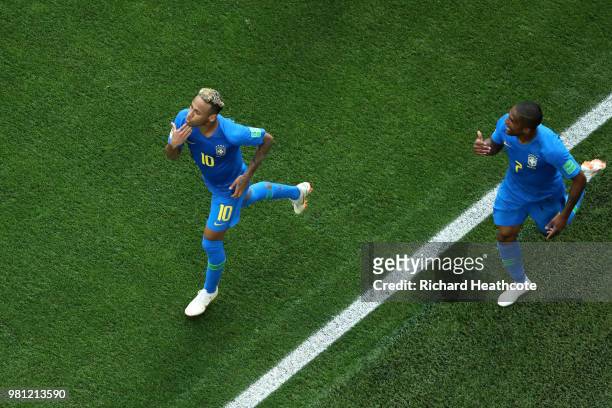 Neymar Jr of Brazil celebrates with teammate Douglas Costa after scoring his team's second goal during the 2018 FIFA World Cup Russia group E match...