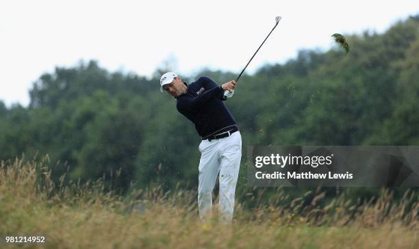 Martin Kaymer of Germnay plays out of the rough on the 6th hole during day two of the BMW International Open at Golf Club Gut Larchenhof on June 22,...