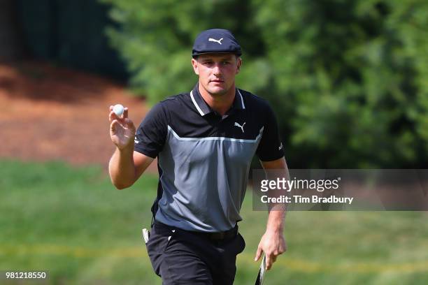 Bryson DeChambeau of the United States acknowledges the gallery after making a par on the eighth green during the second round of the Travelers...