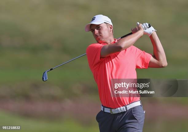 Jordan Spieth watches his fourth shot on the 13th hole during the second round of the Travelers Championship at TPC River Highlands on June 22, 2018...