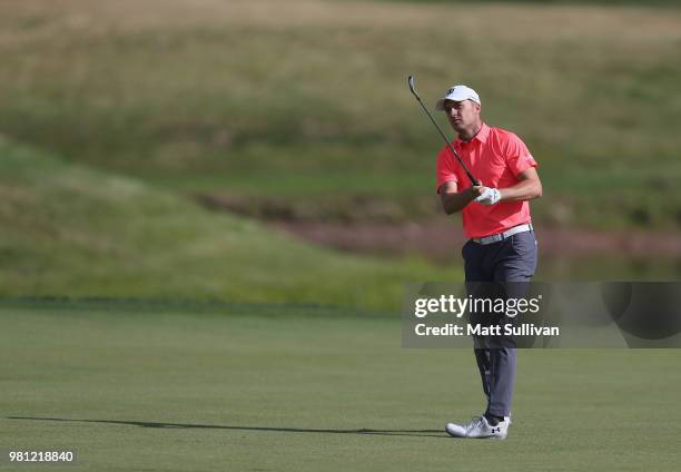 Jordan Spieth watches his fourth shot on the 13th hole during the second round of the Travelers Championship at TPC River Highlands on June 22, 2018...