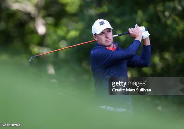 Jordan Spieth watches his tee shot on the 12th hole during the second round of the Travelers Championship at TPC River Highlands on June 22, 2018 in...